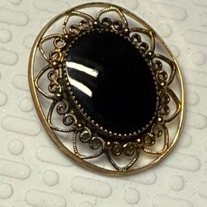 Elegant Black and Gold Filigree Brooch